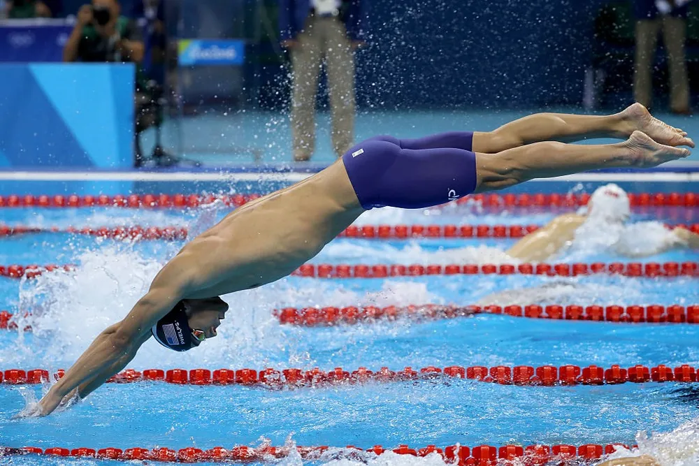 Michael Phelps giúp đội bơi Mỹ lập kỷ lục tại Olympic ảnh 1